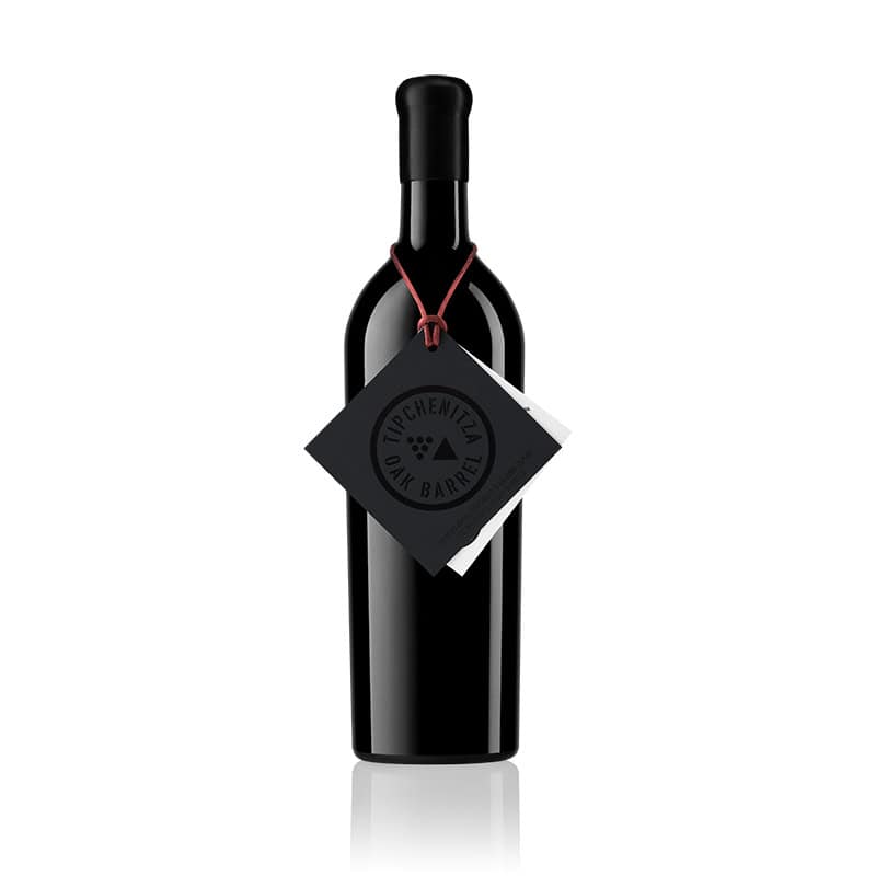 Premium red wine bottle with Intrepid Wines label and tag.